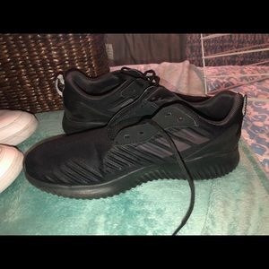 Men’s size 9 new Adidas black shoes.